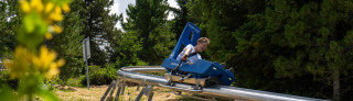 Luge été sur rail luge coaster au Luge Park Chamrousse - © CH - OT Chamrousse Chamrousse luge rail coaster luge park enfant été station montagne grenoble isère alpes france