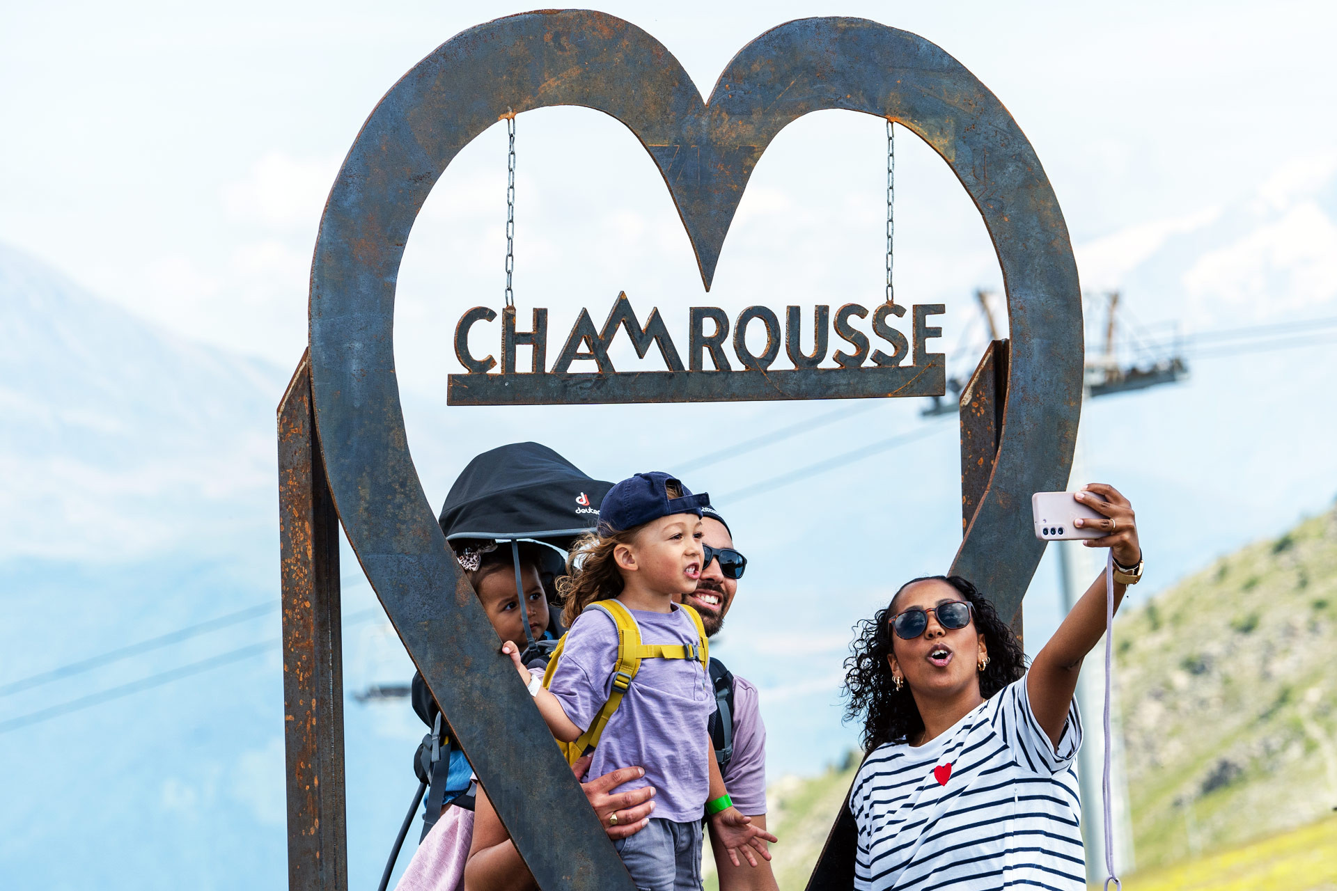 Selfie family walk resort summit in summer