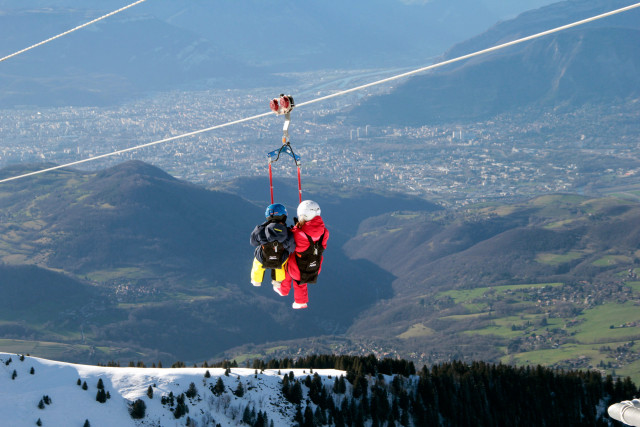 Giant zip line Chamrousse Adrenaline Park winter duo descent
