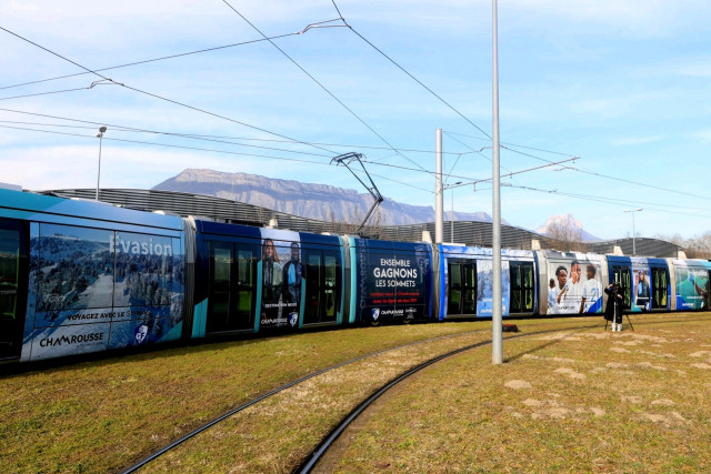 Tram with Chamrousse and Grenoble football club GF38 logo