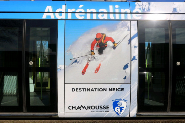 Tram with Chamrousse and Grenoble football club GF38 logo