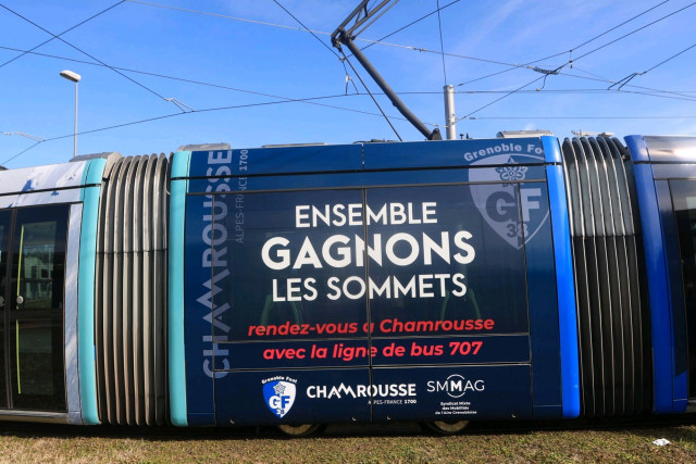 Tram with Chamrousse and Grenoble football club GF38 logo