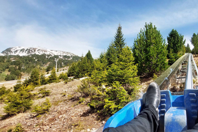 Chamrousse start climb Luge Coaster sled rail experience spring mountain resort grenoble isere french alps france