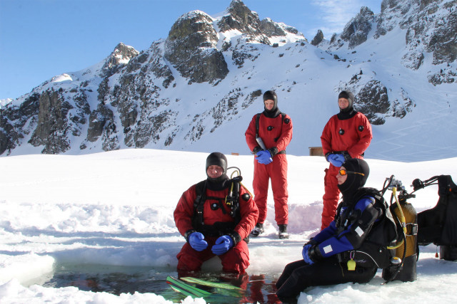 Chamrousse ice diving unusual mountain activity frozen lake winter ski resort grenoble isere french alps france