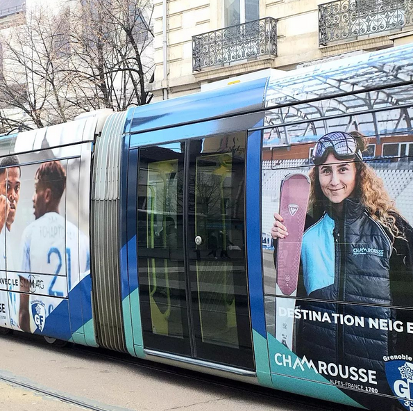 Tram with Chamrousse and Grenoble football club GF38 logo