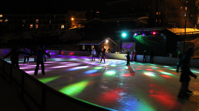 Chamrousse skating rink winter evening music night resort ski mountain grenoble isere french alps france
