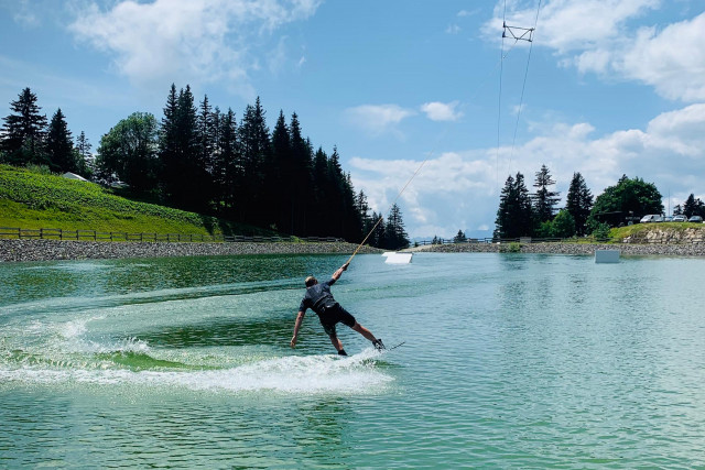 Chamrousse wakeboard water ski activity lake summer resort mountain grenoble belledonne isere french alps france 