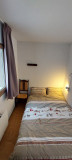 Intérieur 2ème chambre avec lit double Ecrin des neiges C06 Chamrousse