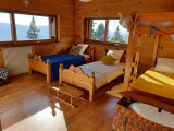 Intérieur chambre 2 lits simples et 2 lits superposées Le Chalet La perchette Chamrousse