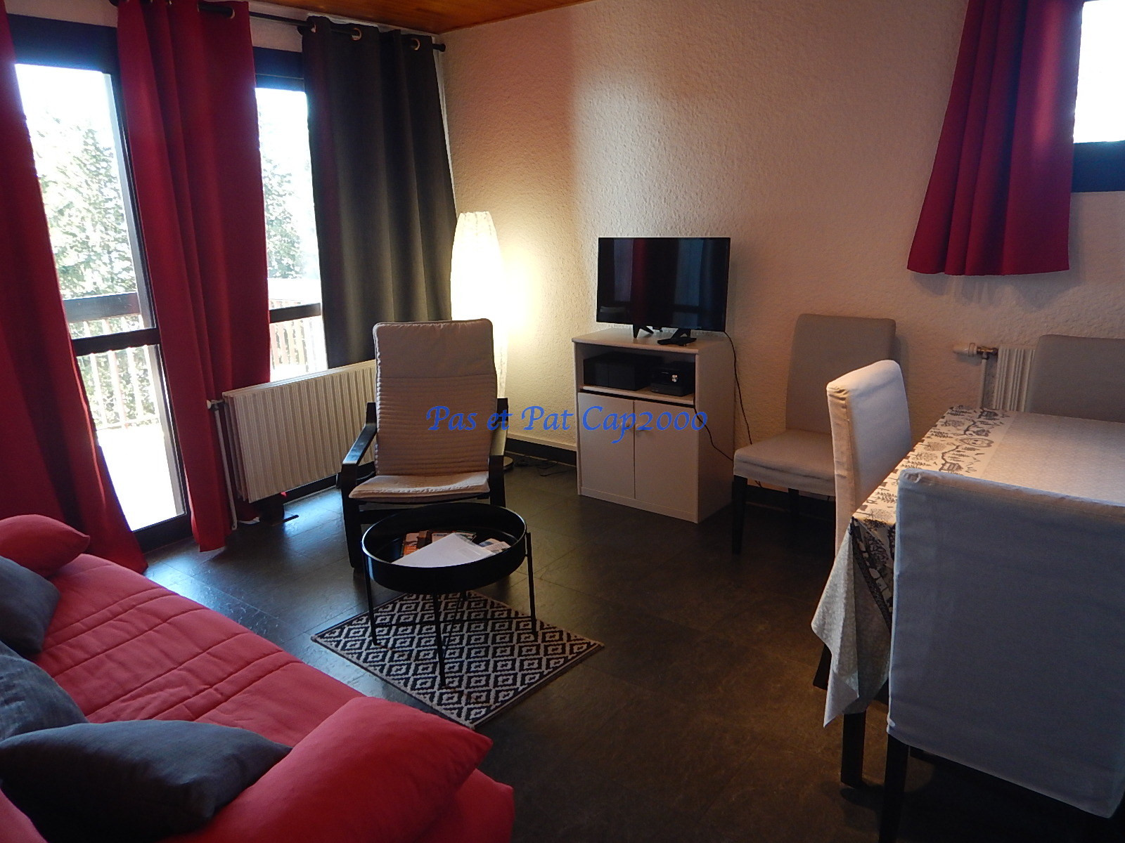 Intérieur salon séjour Cap2000 201 Chamrousse - © DR Chamrousse réservation location appartement 2 pièces 5 personnes 45m² cap2000 201 station ski montagne grenoble isère alpes France