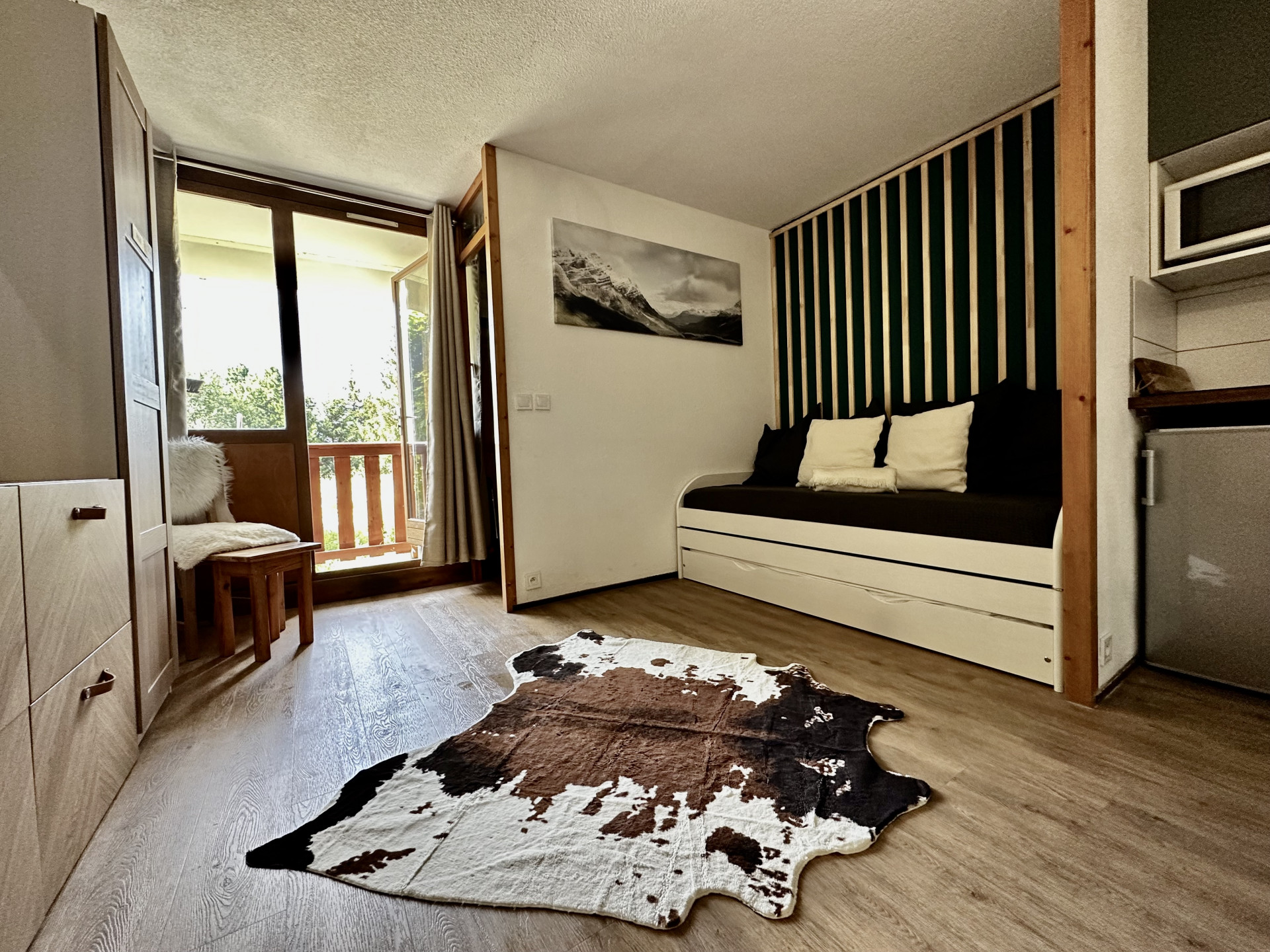 Intérieur salon séjour Edelweiss 113 Chamrousse - © DR Chamrousse réservation location appartement 2 pièces 4 personnes 35m² Edelweiss 113 station ski montagne grenoble isère alpes France