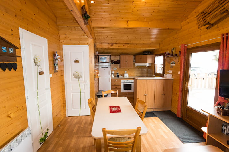 Intérieur salon séjour Le Chalet des Cimes 24 Chamrousse - © DR Chamrousse réservation location chalet 3 pièces, 6 personnes 40m² Le Chalet des cimes 24 station ski montagne grenoble isère alpes France