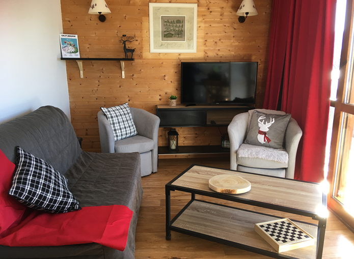 Intérieur salon séjour Le Jourbabes A26 Chamrousse - © DR Chamrousse réservation location appartement 4 pièces 6 personnes 52m² Les Jourbabes A26 station ski montagne grenoble isère alpes France