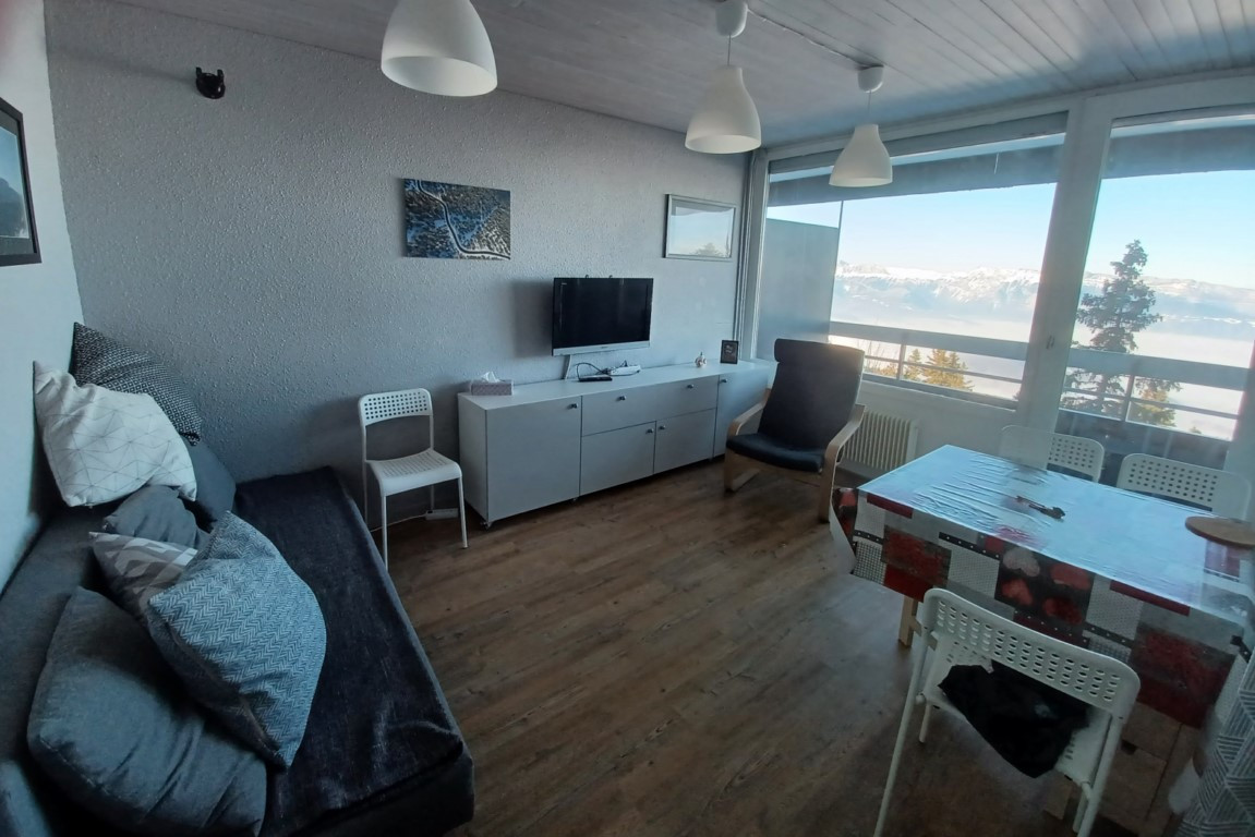 Intérieur salon séjour Les Carlines studio Chamrousse - © DR Chamrousse réservation location appartement studio 4 personnes 25m² Les Carlines studio station ski montagne grenoble isère alpes France