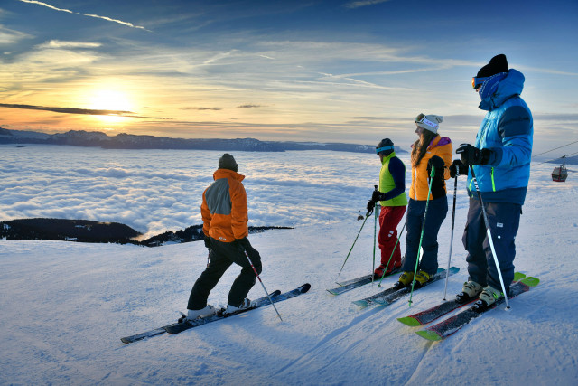 Chamrousse ski in group with friends sunset night mountain resort grenoble isere french alps france
