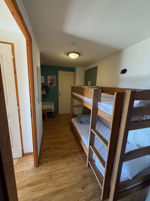 Intérieur cabine 2 lits superposés appartement Silenes A12 Chamrousse Intérieur cabine 2 lits superposés appartement Silenes A12 Chamrousse