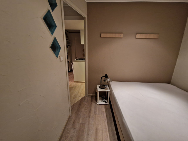 Intérieur chambre L'Olympic 1211 Chamrousse