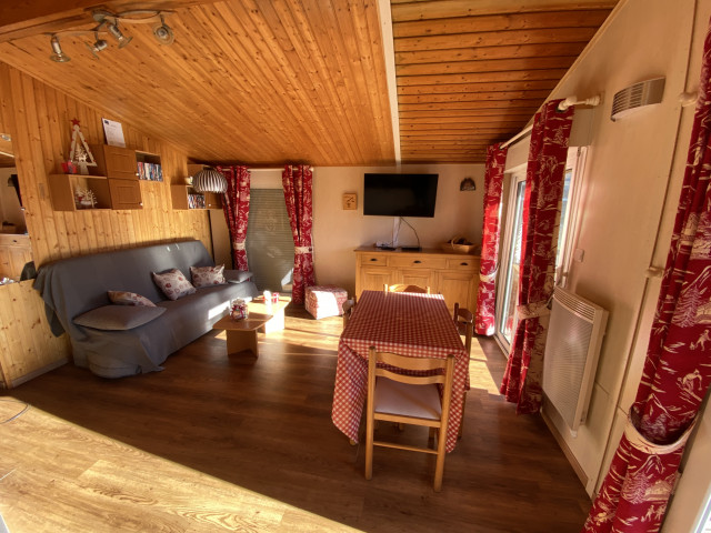 Intérieur salon séjour Le Chalet des Cimes 23 Chamrousse