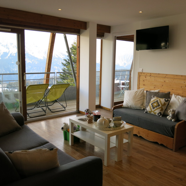 Intérieur salon séjour Le Sorbier A35 Chamrousse - © DR Chamrousse réservation location appartement 3 pièces 8 personnes 70m² Le Sorbier A35 station ski montagne grenoble isère alpes France